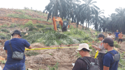 Lokasi kejadian yang diberi garis polisi.