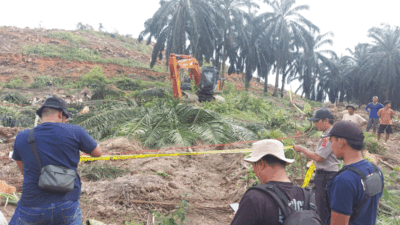 Lokasi kejadian yang diberi garis polisi.