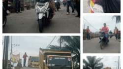 Pemuda Pancasila atur bantu pengendara untuk melintyasi jembatan dengan lancar di Jembatan Nagur