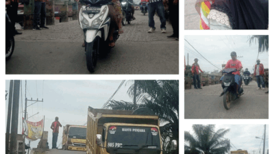 Pemuda Pancasila atur bantu pengendara untuk melintyasi jembatan dengan lancar di Jembatan Nagur