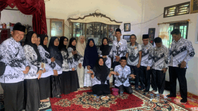 PGRI Solok Selatan Takziah ke Rumah Duka Almarhum Sutrisno, Serahkan Donasi Rp20,6 Juta